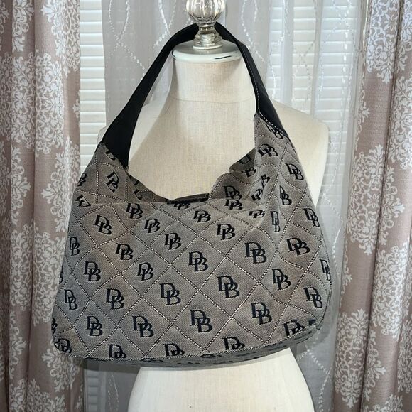 Black and white Dooney and bourke. - Picture 2 of 10